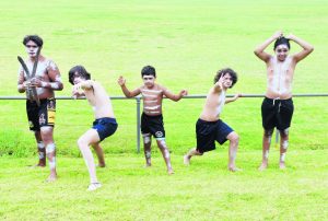 Ernie Peterson Junior, Errol Packham, Quade Peterson, Joseph Packham and Levi Johnson, who are members of the Galari Bila Wagadhaanys Dance Group, performed "Wiradjuri Welcome" and "Wiradjuri Cleansing" at the Australia Day event in Condobolin. Image Credit: Melissa Blewitt.