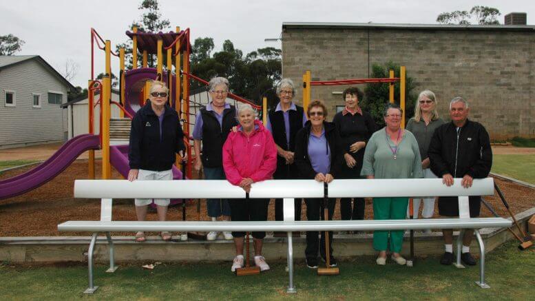 Nancy Dodgson, Dawn Jones, Shirley Bell, Kay Harley, Betsy Wheeler, Elizabeth Weston, Genene Reardon, Liz Crook and Allan Dodgson proudly showing the new seats funded by Evolution Mining. The Club are very grateful to Evolution Mining for the grant. Image Credit: Kathy Parnaby
