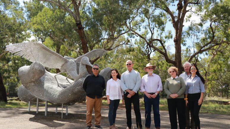 Forbes Shire Council’s Steve Karaitiana, Jenny Webb and Graeme Miller with sculptor Mike van Dam, Arts Society’s Keith Mullette and Lachlan Shire Council’s Debra Kean and Paula Ewing. Image Credit: Forbes Art Society.