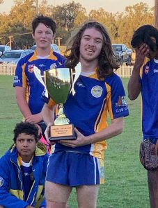 Jesse Pawsey with the ‘Wade Grogan Memorial Pup Cup.’ Image Credit: Condobolin JRL Official Facebook Page.