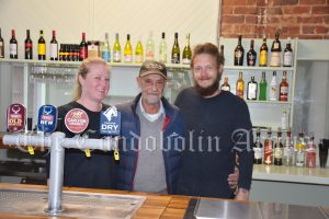  Caroline Stening, Imperial Hotel owner Fred Vella and Felix Tyler were all smiles at the pub’s official first day on Friday, 4 June. The bar, like the rest of the hotel, has had a major makeover. Image Credit: Melissa Blewitt.