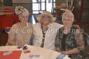 Robyn McAneney, Susan Coombes and Rhonda Williamson were all smiles at the Condobolin RSL Club Melbourne Cup Luncheon. Rhonda was wearing an original creation by Cody Yetman.