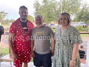 Two of the Willowbend Sports Centre 2877 Christmas Party raffle winners Bruce Sauerbier and Zoe Lark with Manager Brayden Davis. Image Credit: Melissa Blewitt.