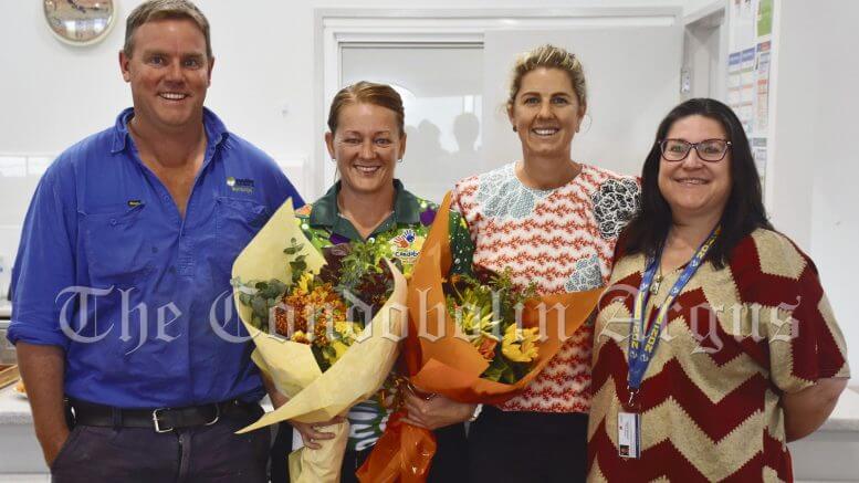 Condobolin Preschool and Childcare Centre Manager Karen Worthington (holding flowers) with members of the Committee