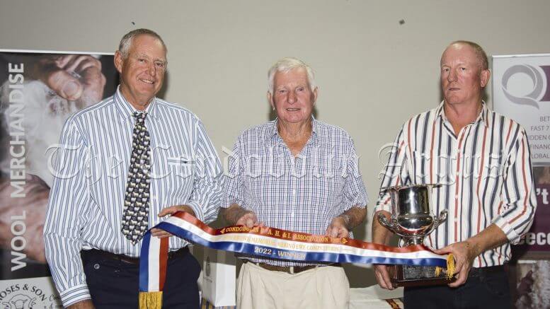 Condobolin PAH and I Association President Jeff Kirk with Allen and Peter Stuckey, of Murtonga Pastoral, who took out the 42nd Don Brown Memorial Merino Ewe Competition.Image Credit: Kathy Parnaby.
