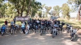 Participants in the 9th Annual Black Dog Ride for Mental Health Awareness and Suicide Prevention at the 'Bird in the Hand' sculpture. Image Credit: Kathy Parnaby.