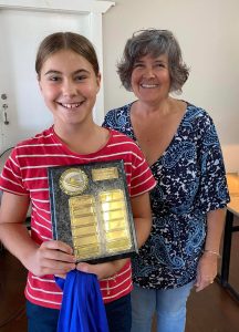 The Lisa Bell Trophy (10 Years and Under Girls Encouragement Award) was won by Anastasia Phillips. She is pictured with Donna Goodsell. Image Credit: Condobolin Amateur Swimming Club Facebook Page.