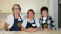 Country Women’s Association (CWA) members Phyllis Perrin, Domenico Musolono and Kathy Parnaby volunteered in the CWA of NSW Tea Rooms at the Sydney Royal Easter Show. Image Contributed.