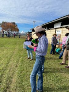 Emmy was one of the 8 selected from the 40+  participants to read aloud her opinion to the audience from the Cattle Junior Judging competition.