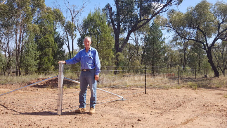 Jason Gavenlock from Central West Local Land Services outside the newly fenced Mugga Hill Reserve. Image Credit: Local Land Services.