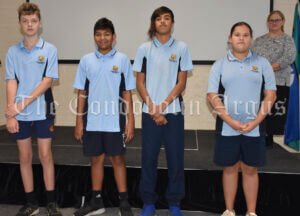 Hunter Collins, Brody Vaeau, Rashard Kirby and Tamera Kirby will represent Year Seven in the SRC. Principal Wendy Scarce (background) presented the SRC badges. Image Credit: Melissa Blewitt.