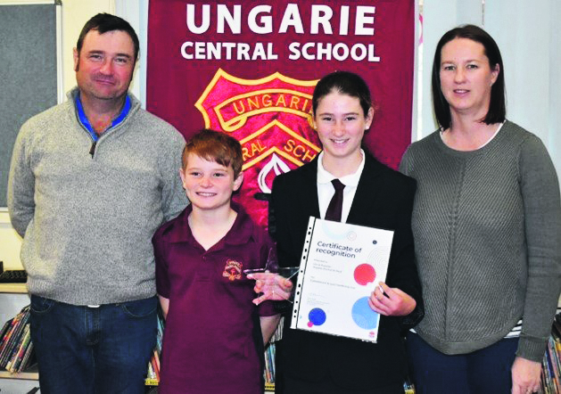 Olivia Rossiter with her parents and brother.