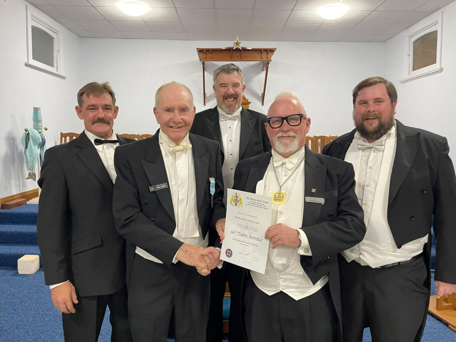 Worshipful Master Brett Farrar, Right Worshipful Stan Cooper, Very Worshipful Russell Cochrane, DGIW, Right Worshipful Gregg Summerhayse, and Right Worshipful Sean Hogan RGC. Right Worshipful Stan Cooper was given his 60-year Service Certificate at Lodge Condobolin Installation on Saturday, 13 May. Image Credit: Anne Coffey.