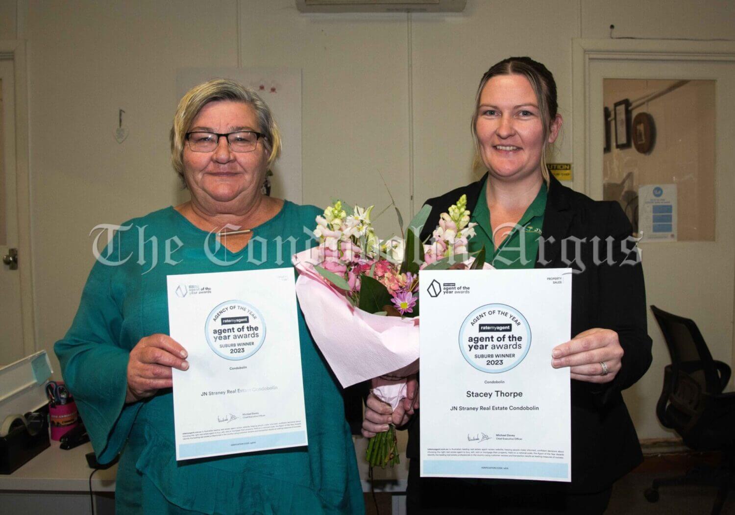 Stacey Thorpe (right) was named the Number One agent in Condobolin, as the suburb winner, based on verified reviews from each property sale in the RateMyAgent Agent of the Year Awards. The JN Straney Agency was also named the suburb winner as the Number One Agency in Condobolin. Kelle Mooney (left) showcases the Agency’s Award. Image Credit: Kathy Parnaby.