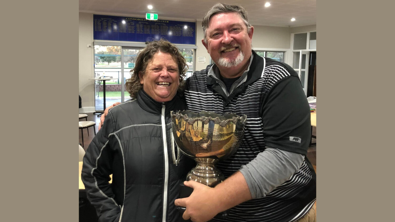 Ian Grimshaw and Pen McLachlan won the 2022 mixed foursomes Championship Handicap trophy. Image Credit: Condobolin Golf Club Facebook Page.