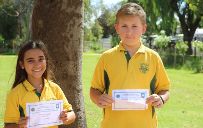 Abigail O'Reilly (Second Prize for International Primary School PowerPoint Competition 2023) and Kayden Pettingill (Second Prize International Junior Postcard Competition 2023). Absent are Chelsea Bendall and Sophia Newham.